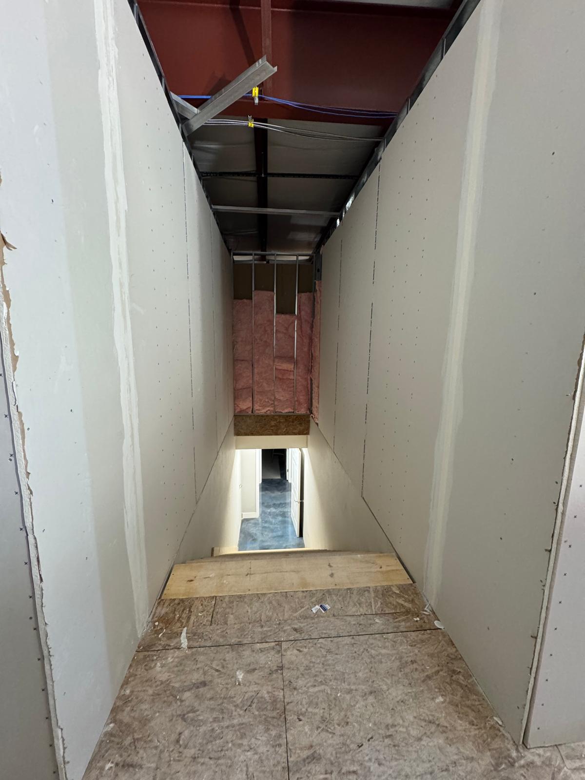 Business stairwell before renovation
